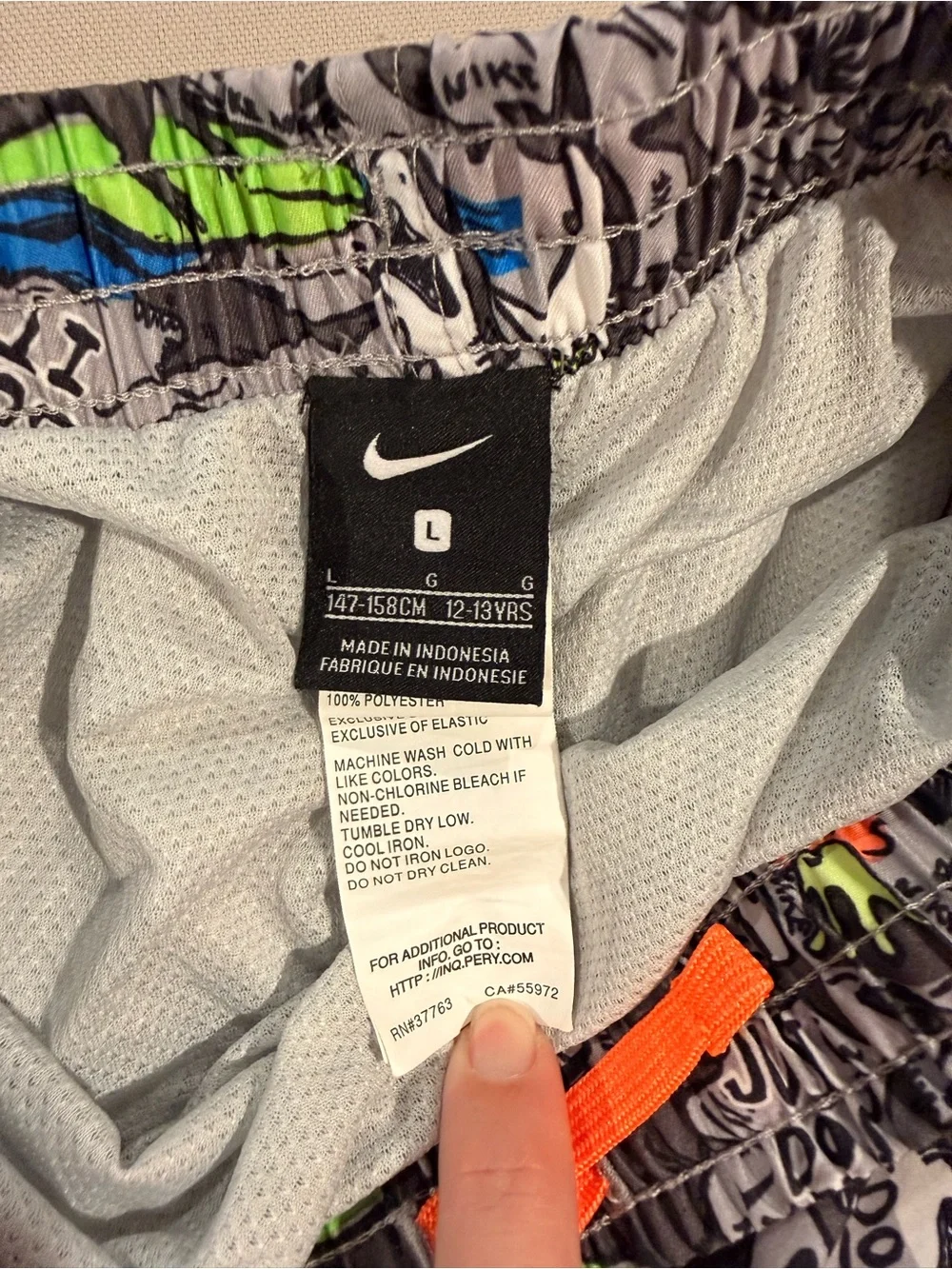 Nike Kids Gray Swim Trunks with Bright Graphic Print